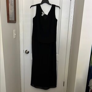 Elegant Black Sleeveless Dress with long sleeved jacket.